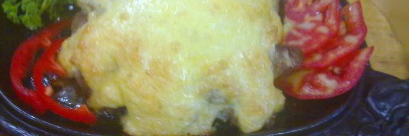 Свинина с грибами под сырной шапочкой