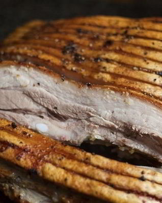 Свинина запеченная с чесноком