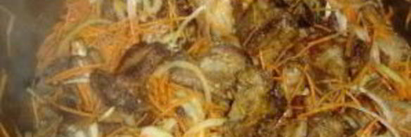 свиные ребрышки, тушеные с овощами