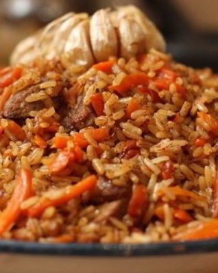 Плов из бурого риса со свининой