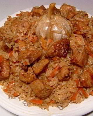 Плов из пропаренного риса со свининой