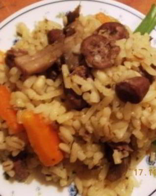 Плов с грибами и куриными сердечками