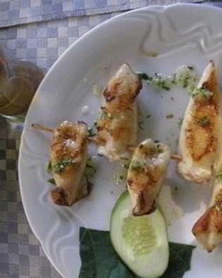 Фаршированные кальмары с грибами и рисом