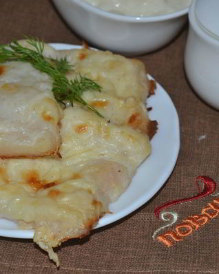 Рыба, запеченная под молочным соусом