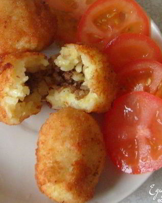 Сицилийские аранчини — рисовые шарики с фаршем