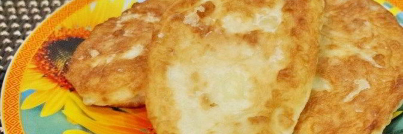 Жареные пирожки с творогом